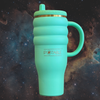 Triple Ripple: Odyssey™ 40oz Tumbler in Emerald Orbit